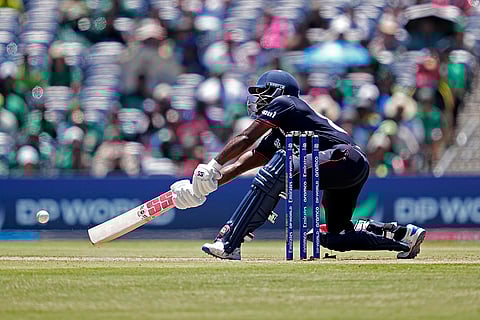 United States' Aaron Jones plays a shot against Pakistan